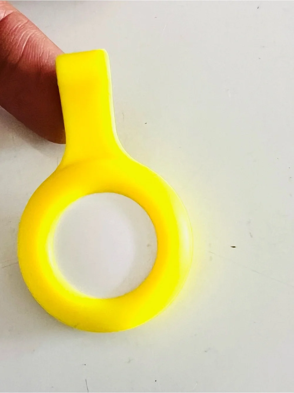 Apple AirTag in Yellow Silicone Clip Holder